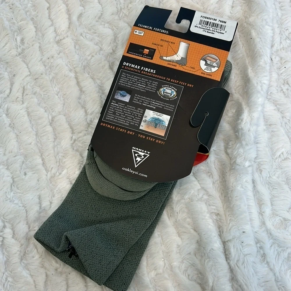 Brand new Oakley, tall crew, tactical socks, olive women 7.5–9.5 men’s 6–8